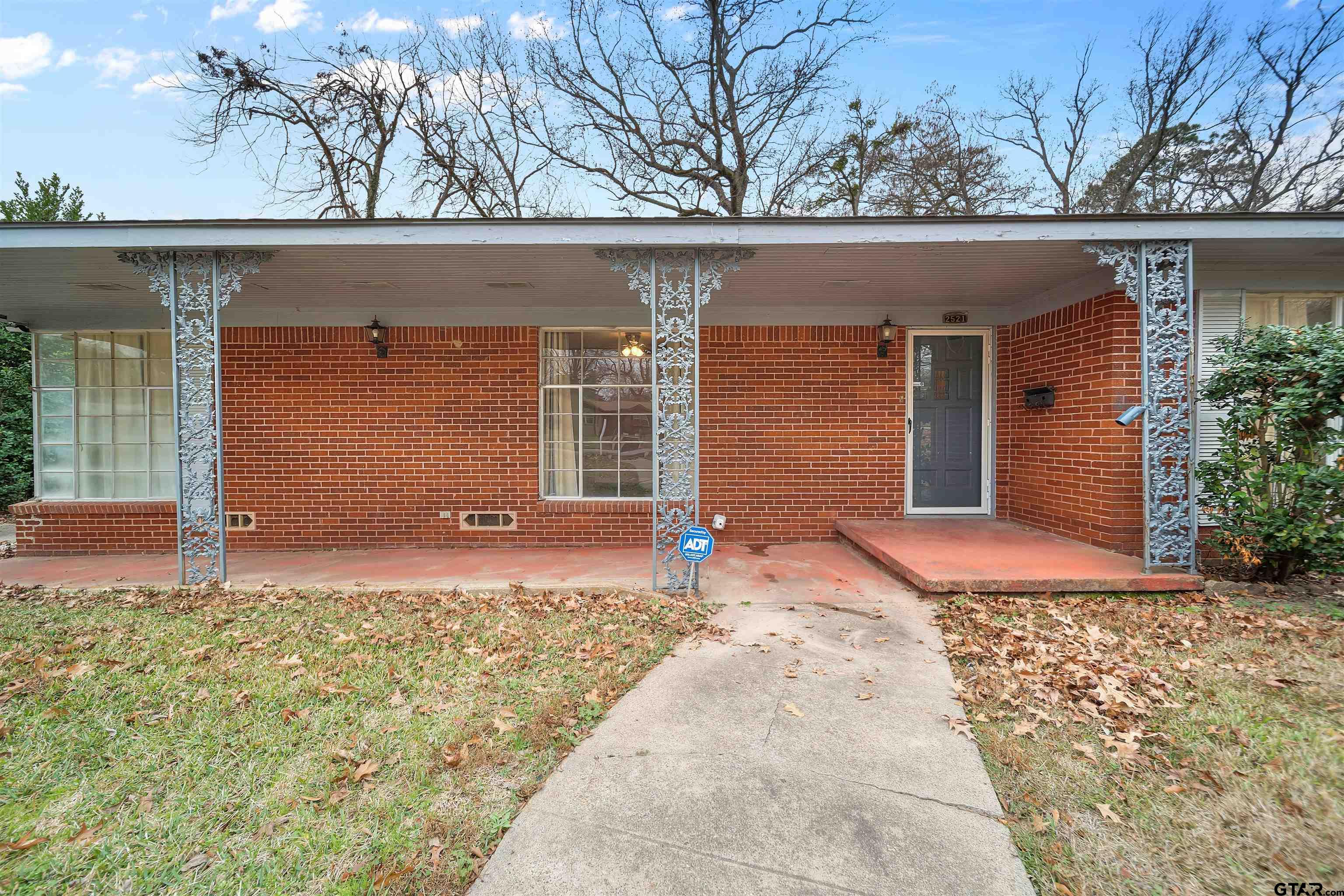 2521 Pounds Tyler, TX 75701 - Photo 2 of 40 front view of a house with a yard