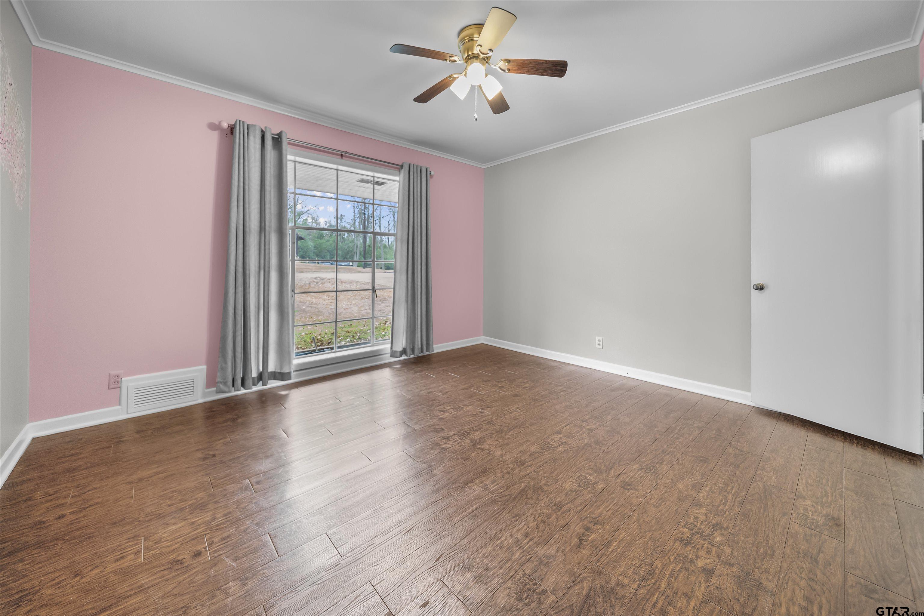 2521 Pounds Tyler, TX 75701 - Photo 23 of 40 a view of room window and wooden floor
