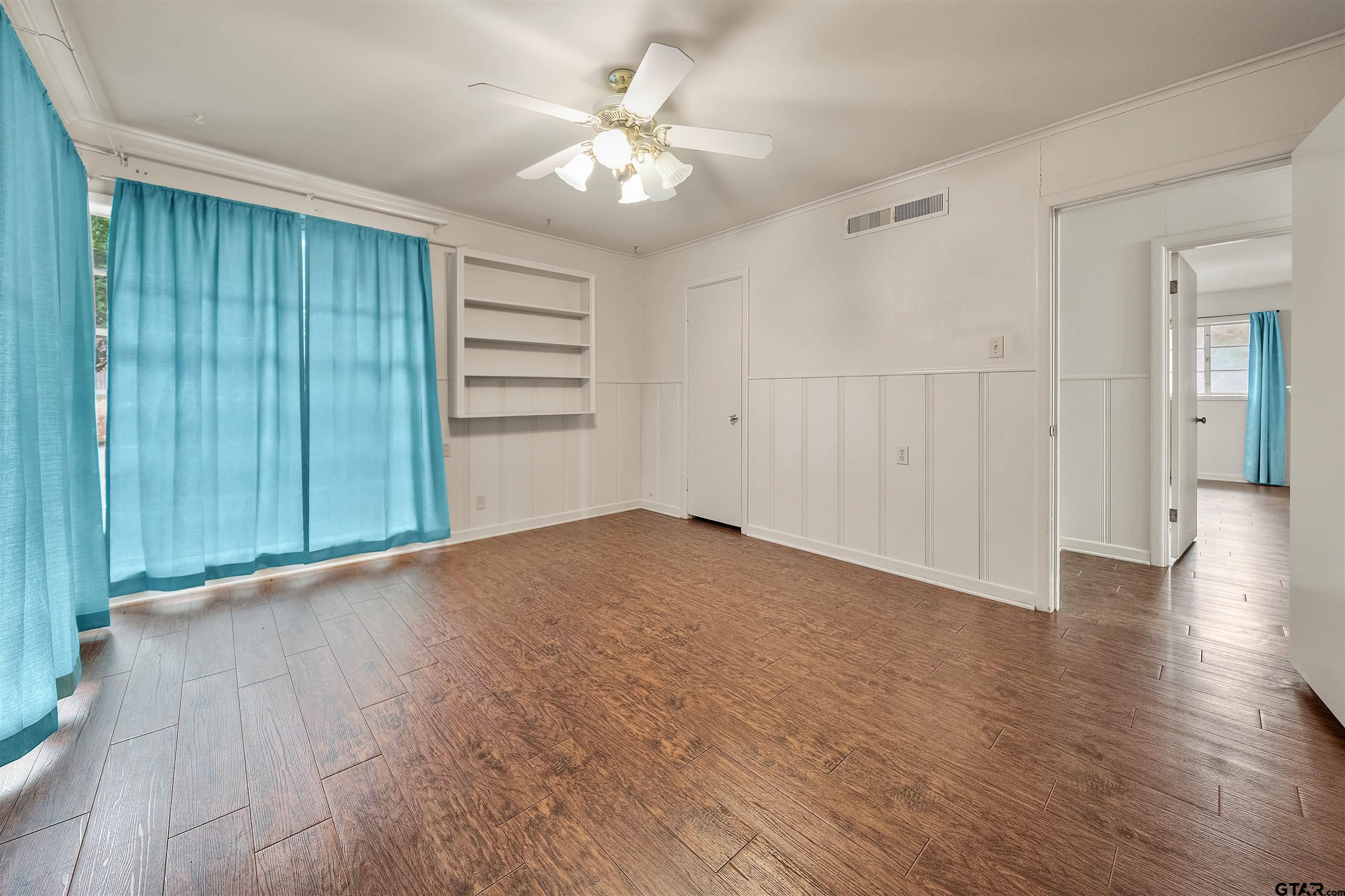 2521 Pounds Tyler, TX 75701 - Photo 27 of 40 wooden floor in an empty room with a window