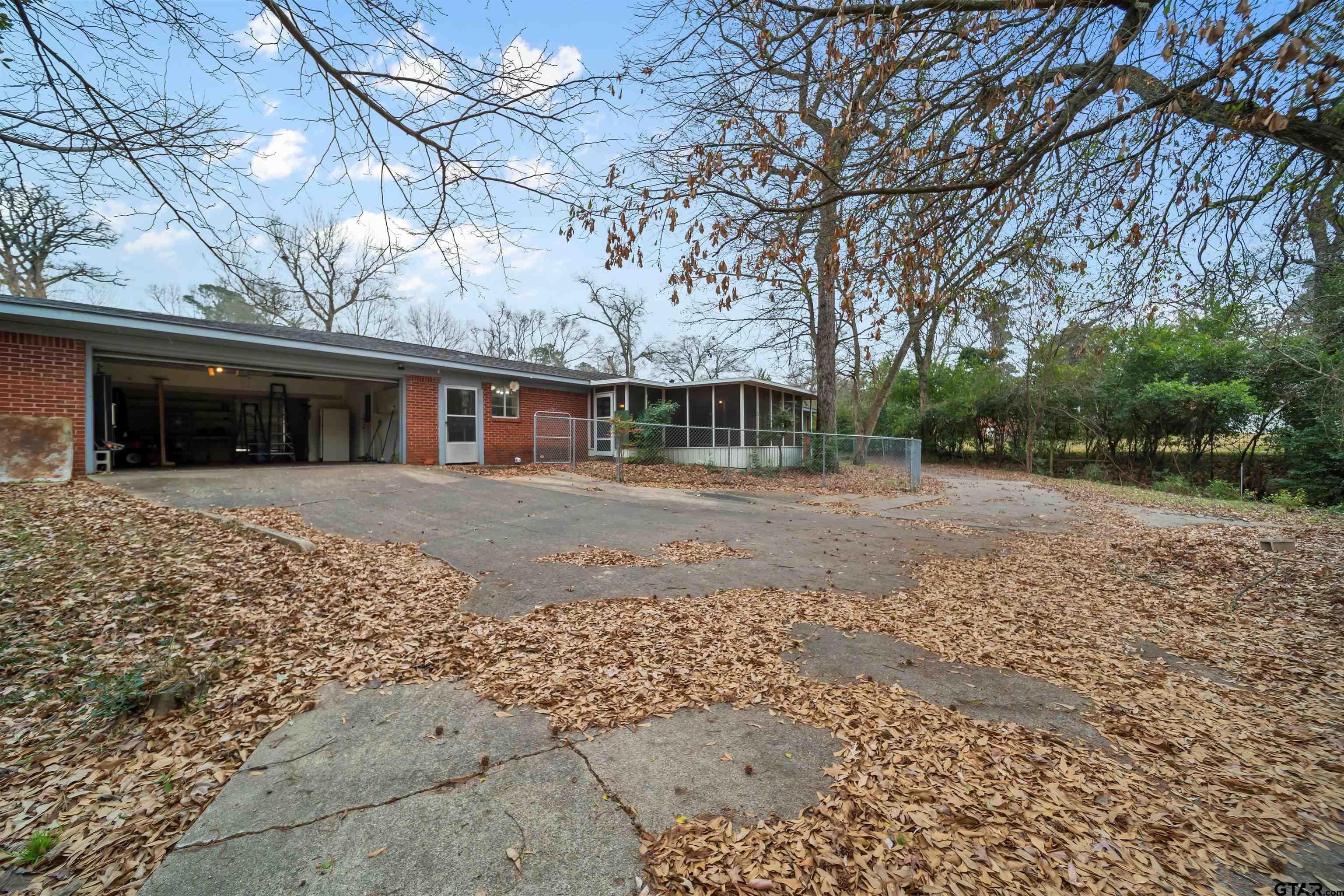 2521 Pounds Tyler, TX 75701 - Photo 40 of 40 a front view of a house with a yard