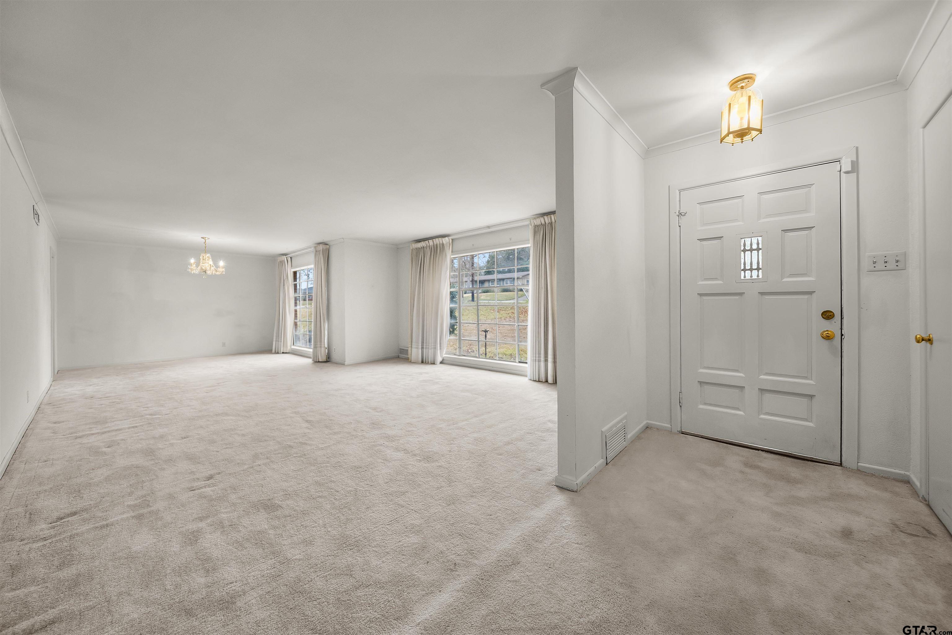 2521 Pounds Tyler, TX 75701 - Photo 4 of 40 a view of an empty room with a fireplace