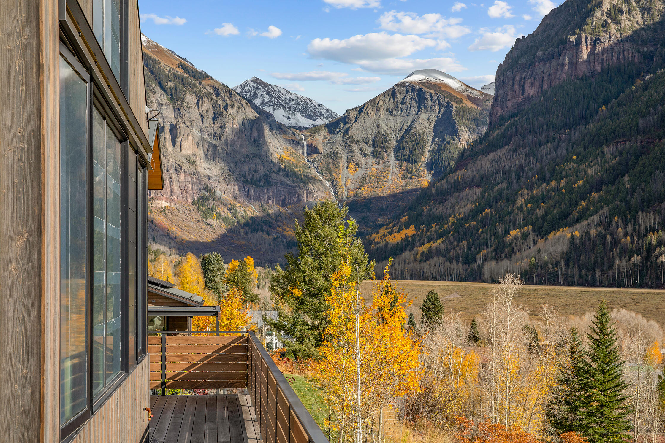 764 Primrose Lane Telluride, CO 81435 - Photo 16 of 23 a view of balcony with wooden floor and fence
