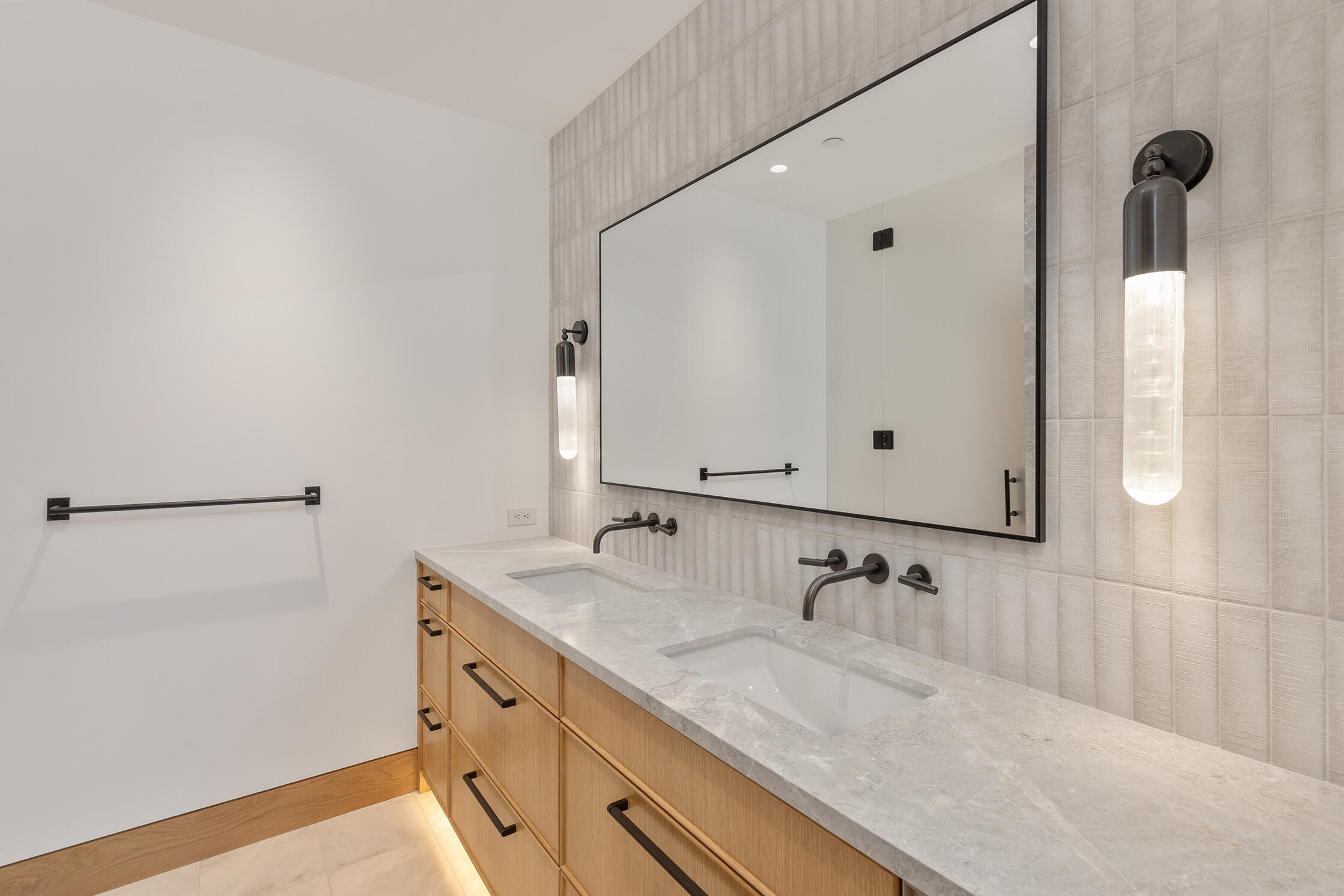 764 Primrose Lane Telluride, CO 81435 - Photo 7 of 23 a bathroom with a granite countertop sink and a mirror