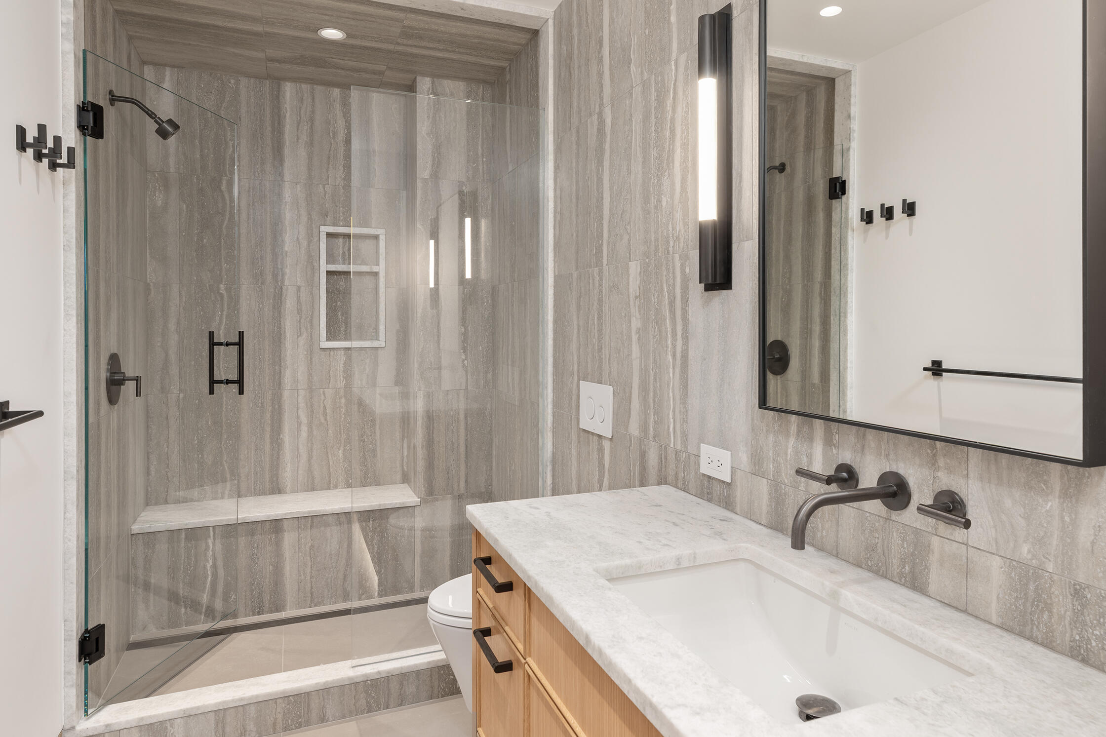 764 Primrose Lane Telluride, CO 81435 - Photo 8 of 23 a bathroom with a granite countertop sink a mirror and shower