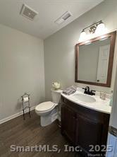 324 Capitol Avenue Waterbury, CT 06705 - Photo 12 of 32 a bathroom with a sink vanity and a mirror