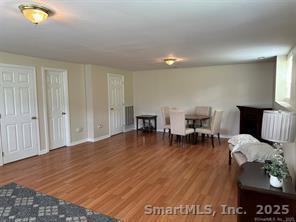 324 Capitol Avenue Waterbury, CT 06705 - Photo 13 of 32 a living room with furniture and wooden floor