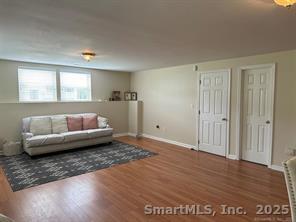 324 Capitol Avenue Waterbury, CT 06705 - Photo 16 of 32 a living room with furniture and a couch