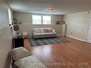 324 Capitol Avenue Waterbury, CT 06705 - Photo 17 of 32 a living room with furniture and a couch
