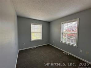 324 Capitol Avenue Waterbury, CT 06705 - Photo 2 of 32 an empty room with a window