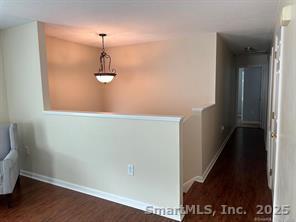 324 Capitol Avenue Waterbury, CT 06705 - Photo 30 of 32 a view of a hallway with wooden floor