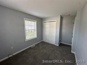 324 Capitol Avenue Waterbury, CT 06705 - Photo 3 of 32 an empty room with windows