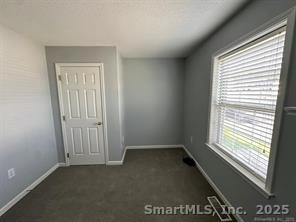 324 Capitol Avenue Waterbury, CT 06705 - Photo 31 of 32 a view of an empty room with a window