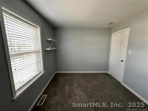 324 Capitol Avenue Waterbury, CT 06705 - Photo 32 of 32 a view of an empty room and a window
