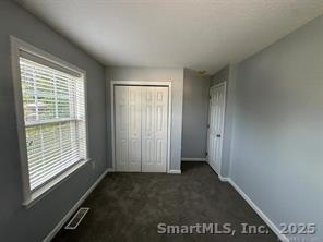324 Capitol Avenue Waterbury, CT 06705 - Photo 4 of 32 a view of an empty room with a window