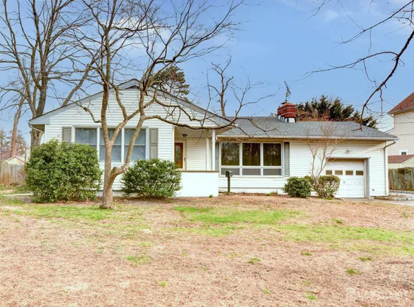 front view of a house with a patio