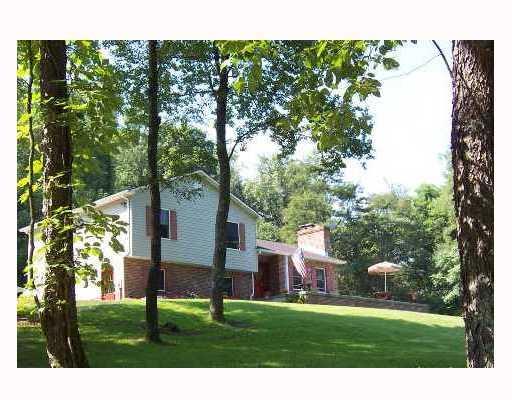 266 Roupe Road Eighty Four, PA 15330 - Photo 1 of 8 Exterior Front. Private setting, nestled in the trees
