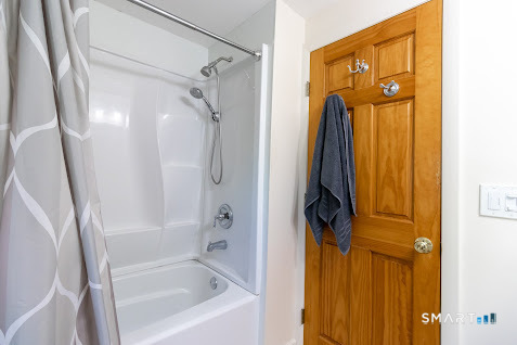 763 North Street Suffield, CT 06078 - Photo 35 of 40 a bathroom with a shower