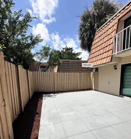 a view of a wooden fence