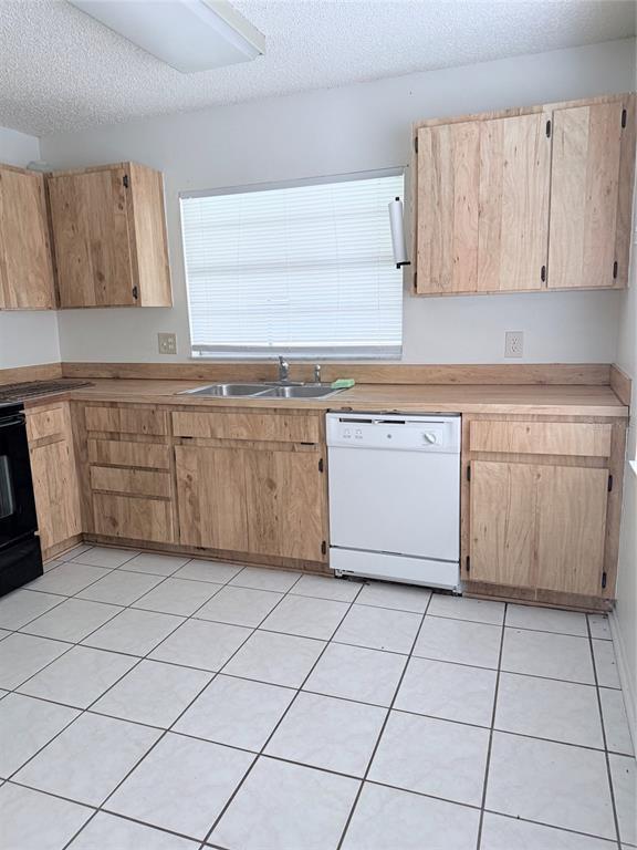 1636 Baker Road Lutz, FL 33559 - Photo 5 of 13 a kitchen with cabinets and appliances
