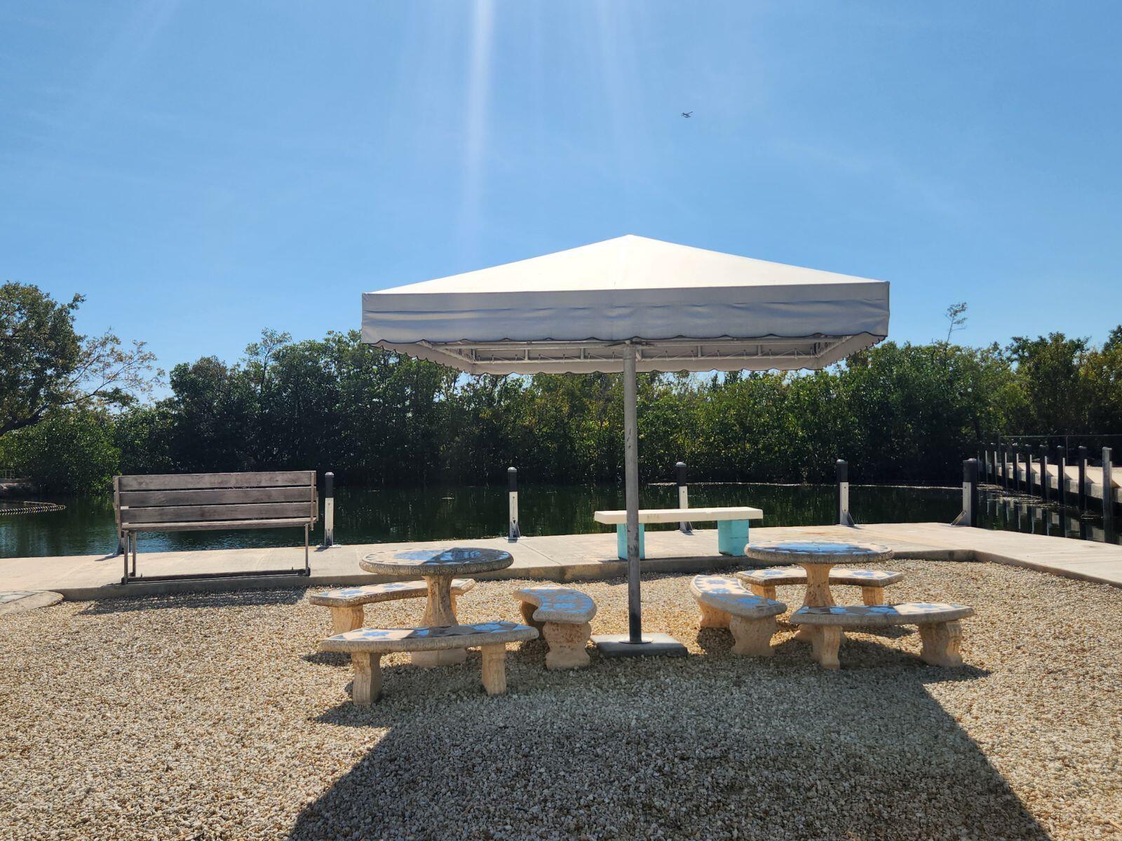 338 Sound Drive Key Largo, FL 33037 - Photo 11 of 13 a view of an outdoor sitting area with couch