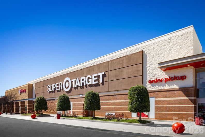 9546 Teamwork Street Northwest Concord, NC 28027 - Photo 22 of 23 a view of a street with cars