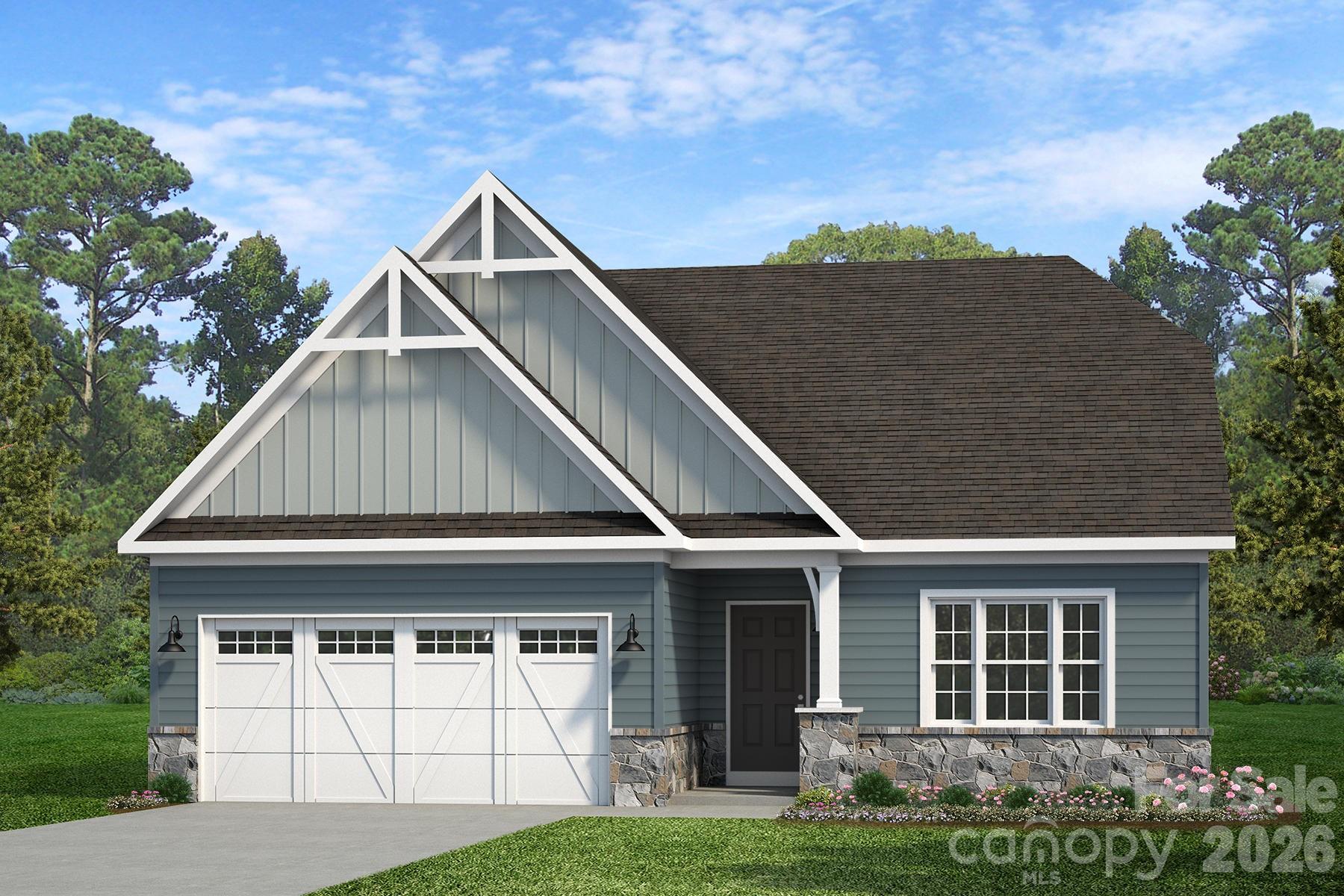 200 Ervin Road, Unit CALDWELL Mooresville, NC 28117 - Photo 2 of 7 a front view of a house with garden