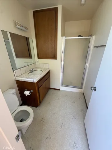 a view of balcony with wooden floor