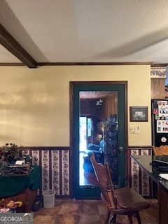 376 Paoli Road Carlton, GA 30627 - Photo 21 of 51 a living room with furniture a rug and a potted plant