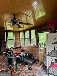 376 Paoli Road Carlton, GA 30627 - Photo 3 of 51 a living room with furniture and a floor to ceiling window
