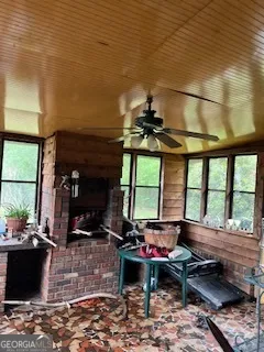 a kitchen with a sink cabinets and window