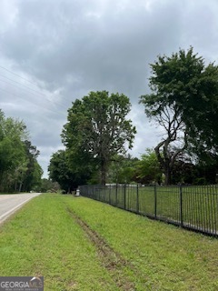 376 Paoli Road Carlton, GA 30627 - Photo 6 of 51 a view of a yard with a trampoline