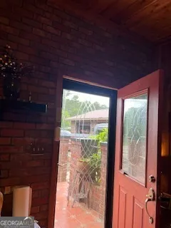 a fireplace with a clock on the wall