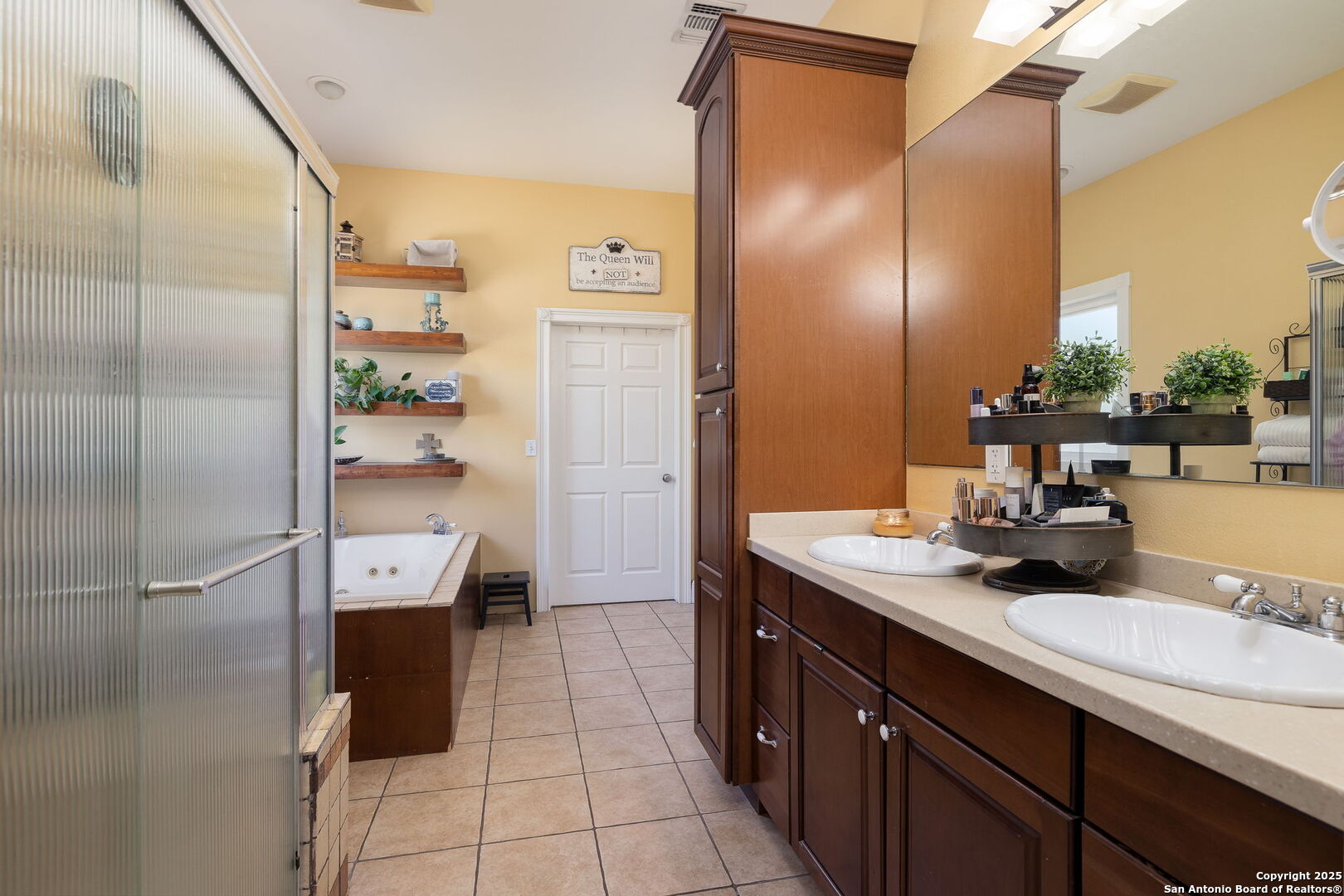42 Tower Road Boerne, TX 78006 - Photo 20 of 50 a bathroom with a sink double vanity and a mirror