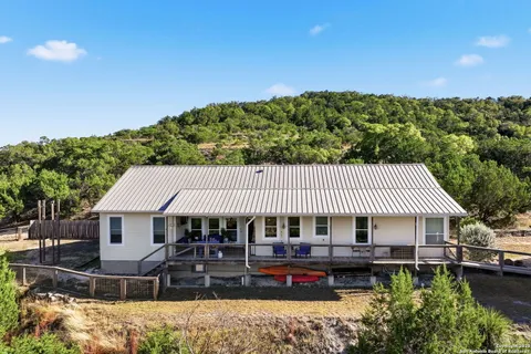 a view of a house with a swimming pool