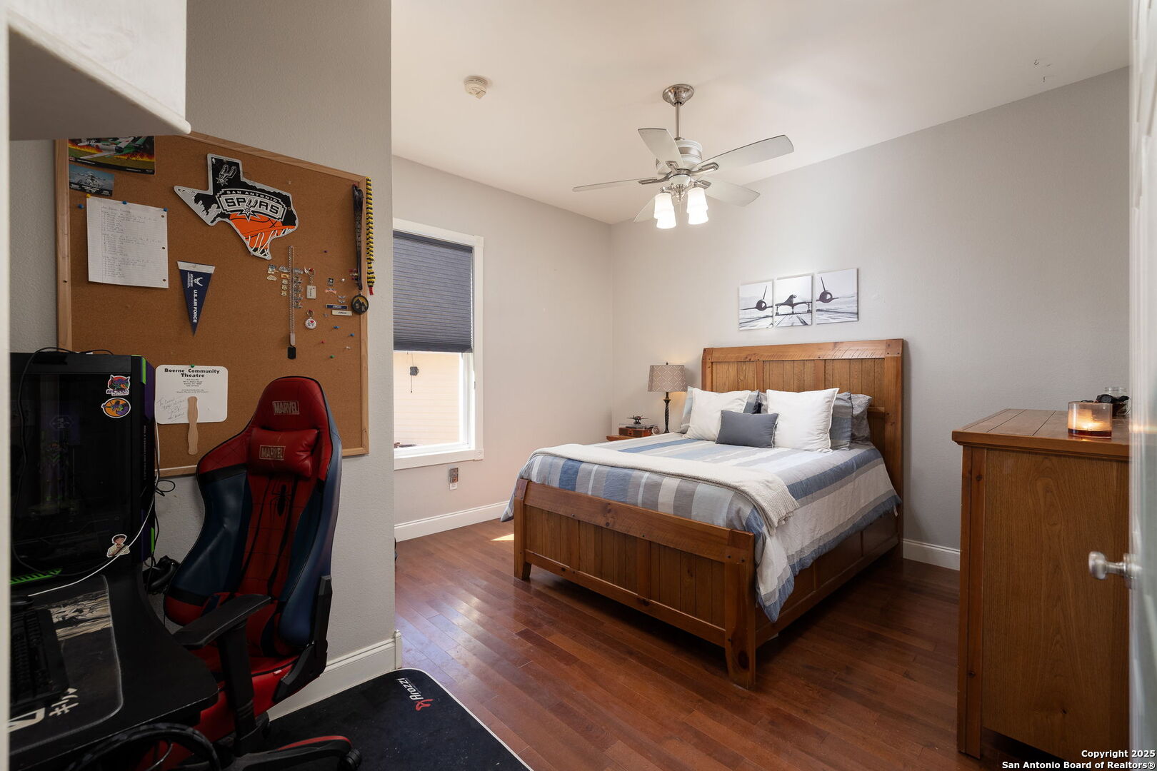 42 Tower Road Boerne, TX 78006 - Photo 23 of 50 a bedroom with bed and wooden floor