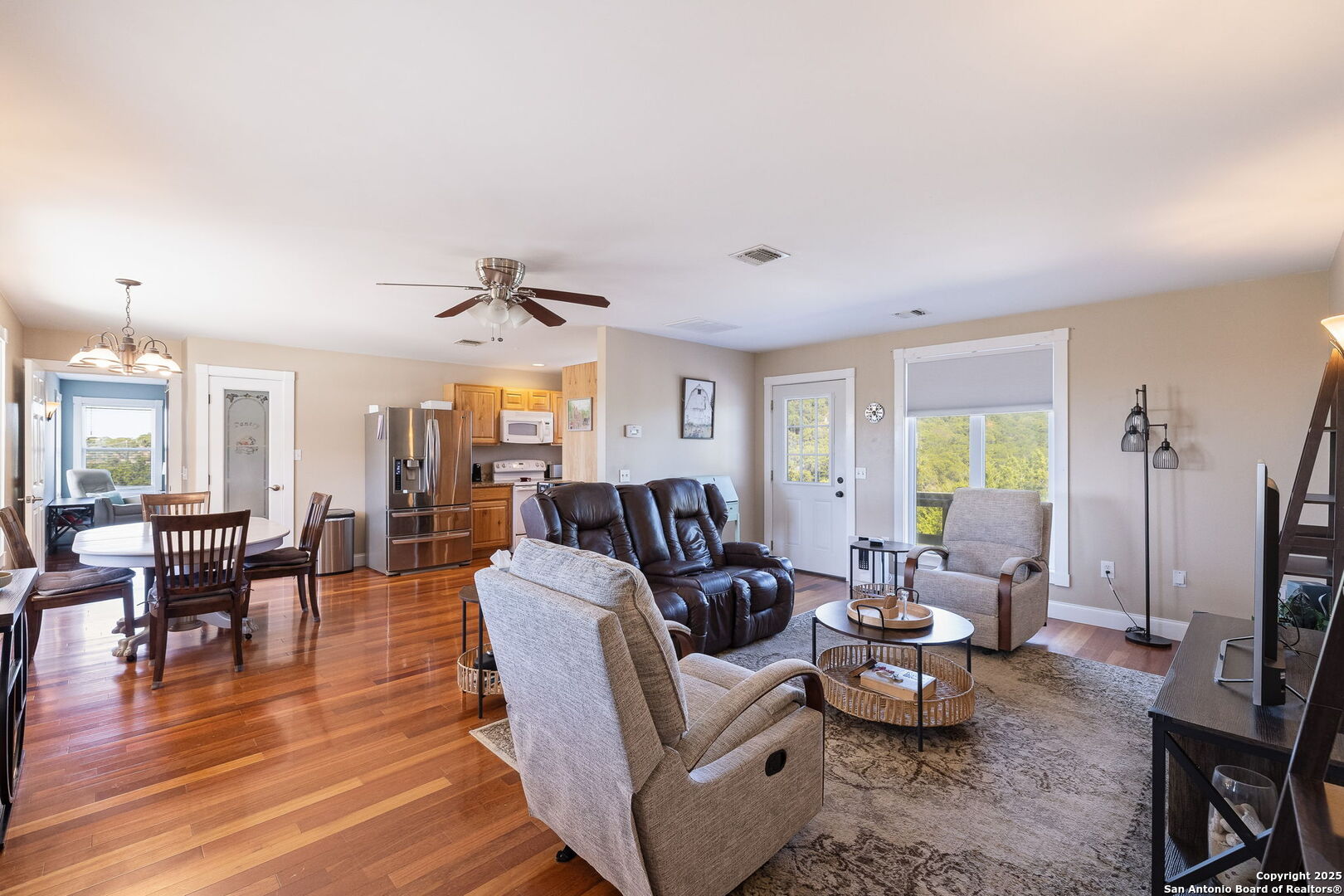 42 Tower Road Boerne, TX 78006 - Photo 30 of 50 a living room with furniture and wooden floor