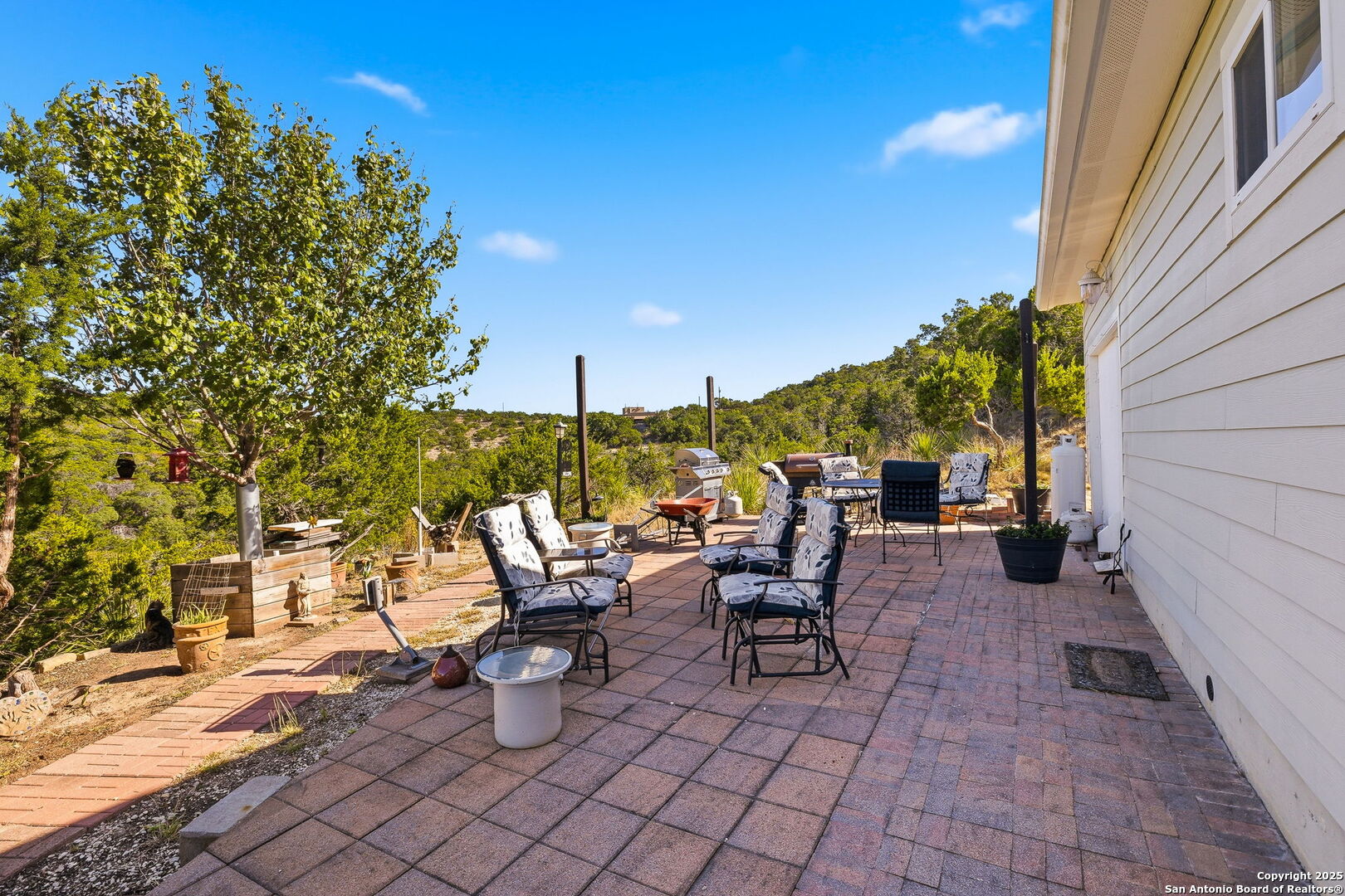 42 Tower Road Boerne, TX 78006 - Photo 37 of 50 a view of a patio with chairs and tables