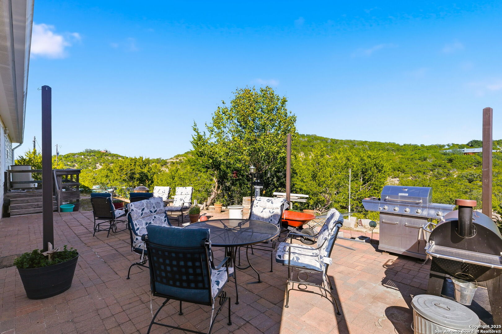 42 Tower Road Boerne, TX 78006 - Photo 38 of 50 a view of a patio with a table and chairs