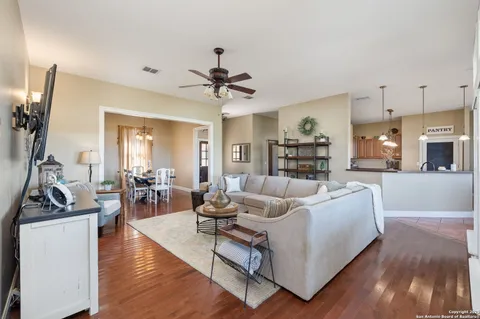 a large kitchen with cabinets a sink and dishwasher