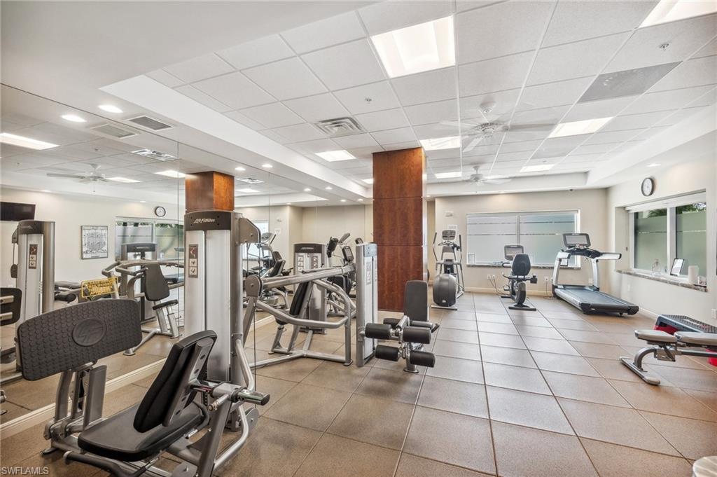 265 Indies Way, Unit 802 Naples, FL 34110 - Photo 44 of 50 a view of a room with gym equipment