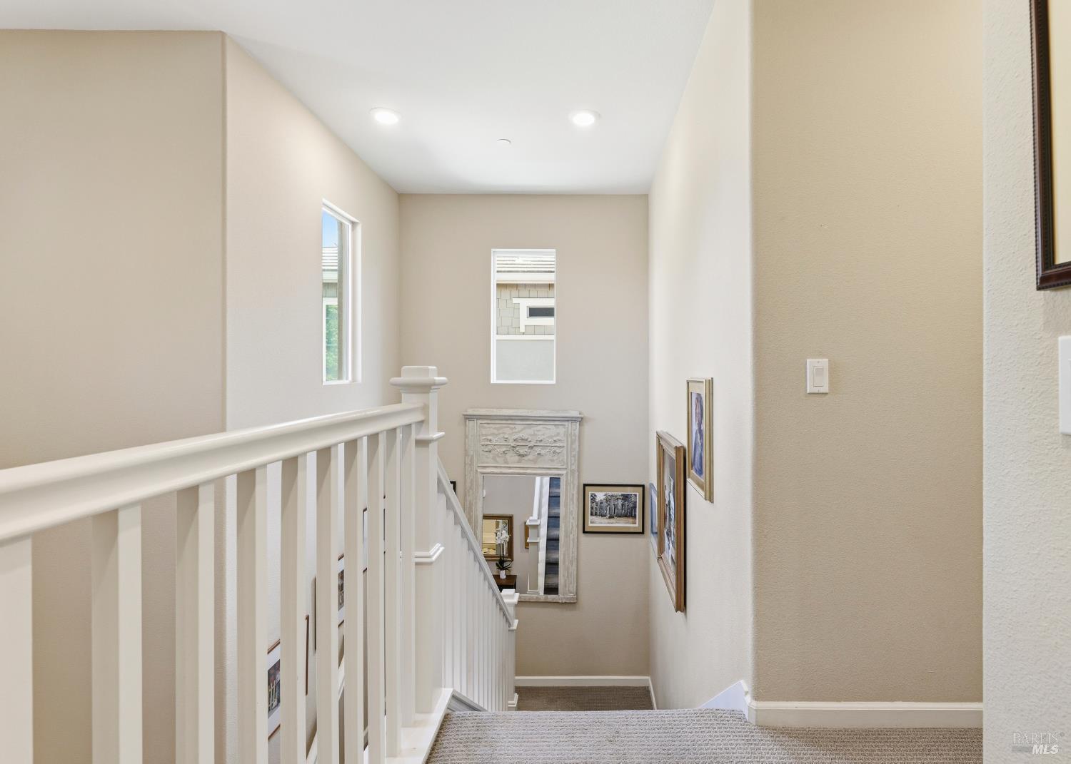 5533 Kennedy Place Rohnert Park, CA 94928 - Photo 14 of 63 a view of a hallway with wooden floor and staircase