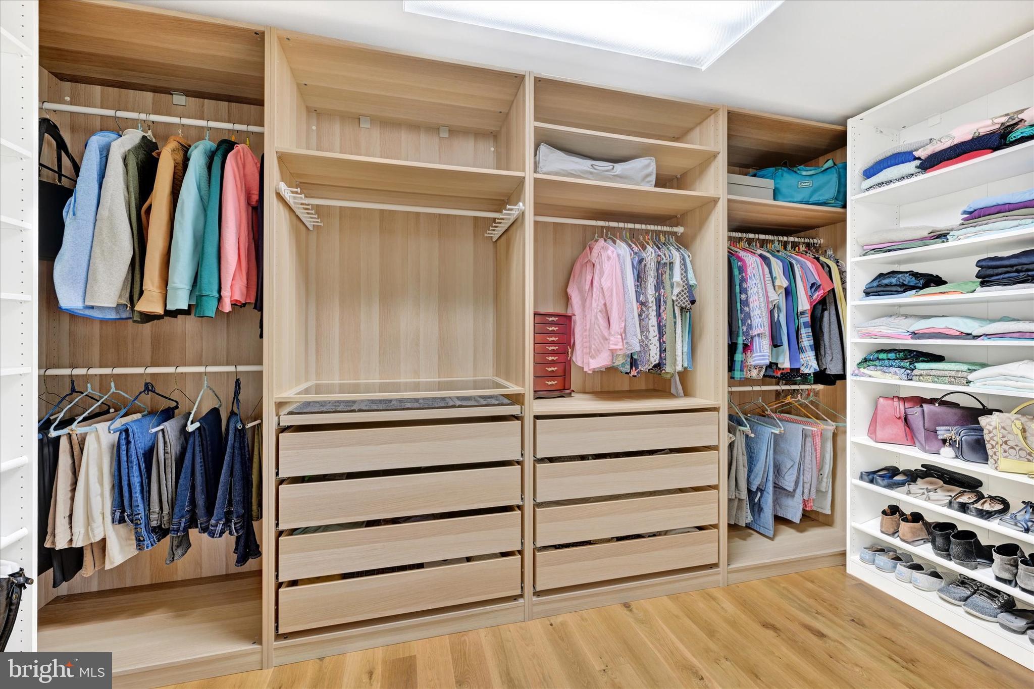 2524 Jennings Chapel Road Woodbine, MD 21797 - Photo 14 of 41 a view of walk in closet with clothes and shoes