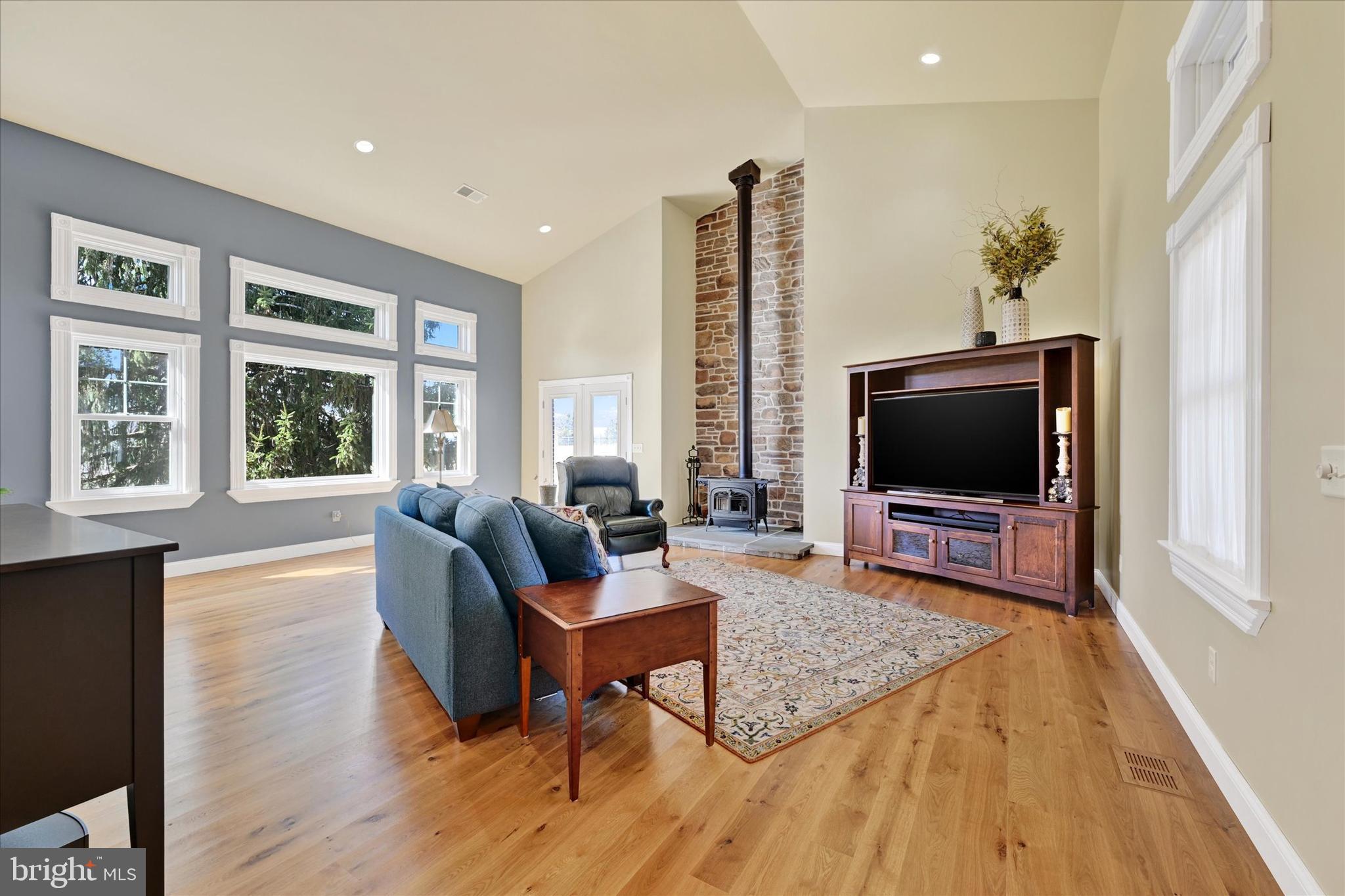2524 Jennings Chapel Road Woodbine, MD 21797 - Photo 23 of 41 a living room with furniture and a flat screen tv