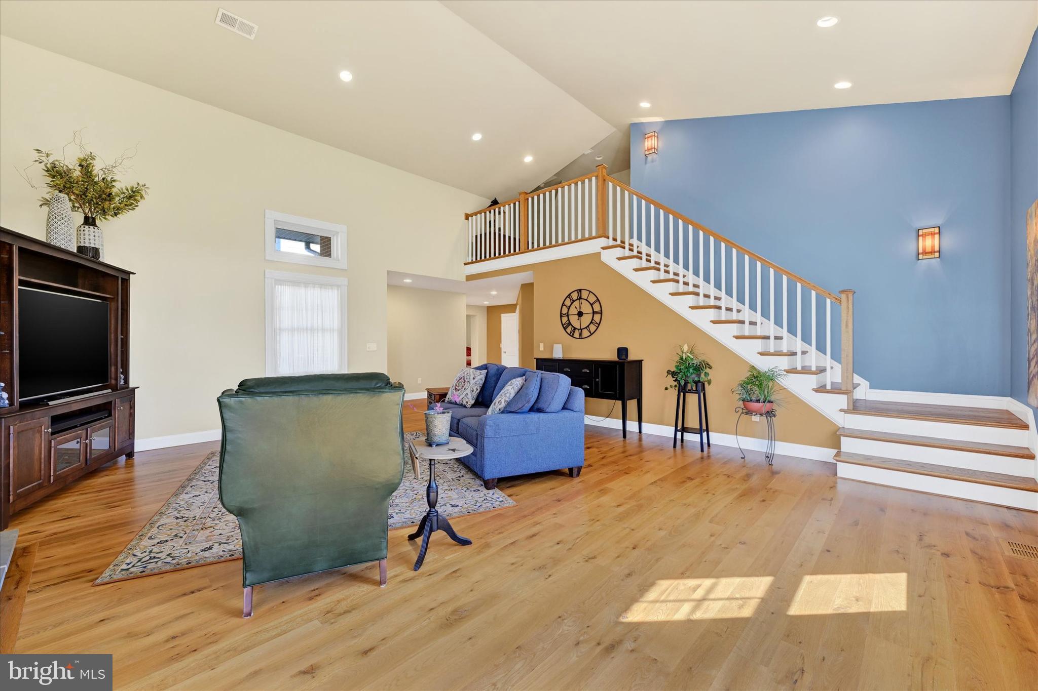 2524 Jennings Chapel Road Woodbine, MD 21797 - Photo 25 of 41 a living room with furniture and a flat screen tv