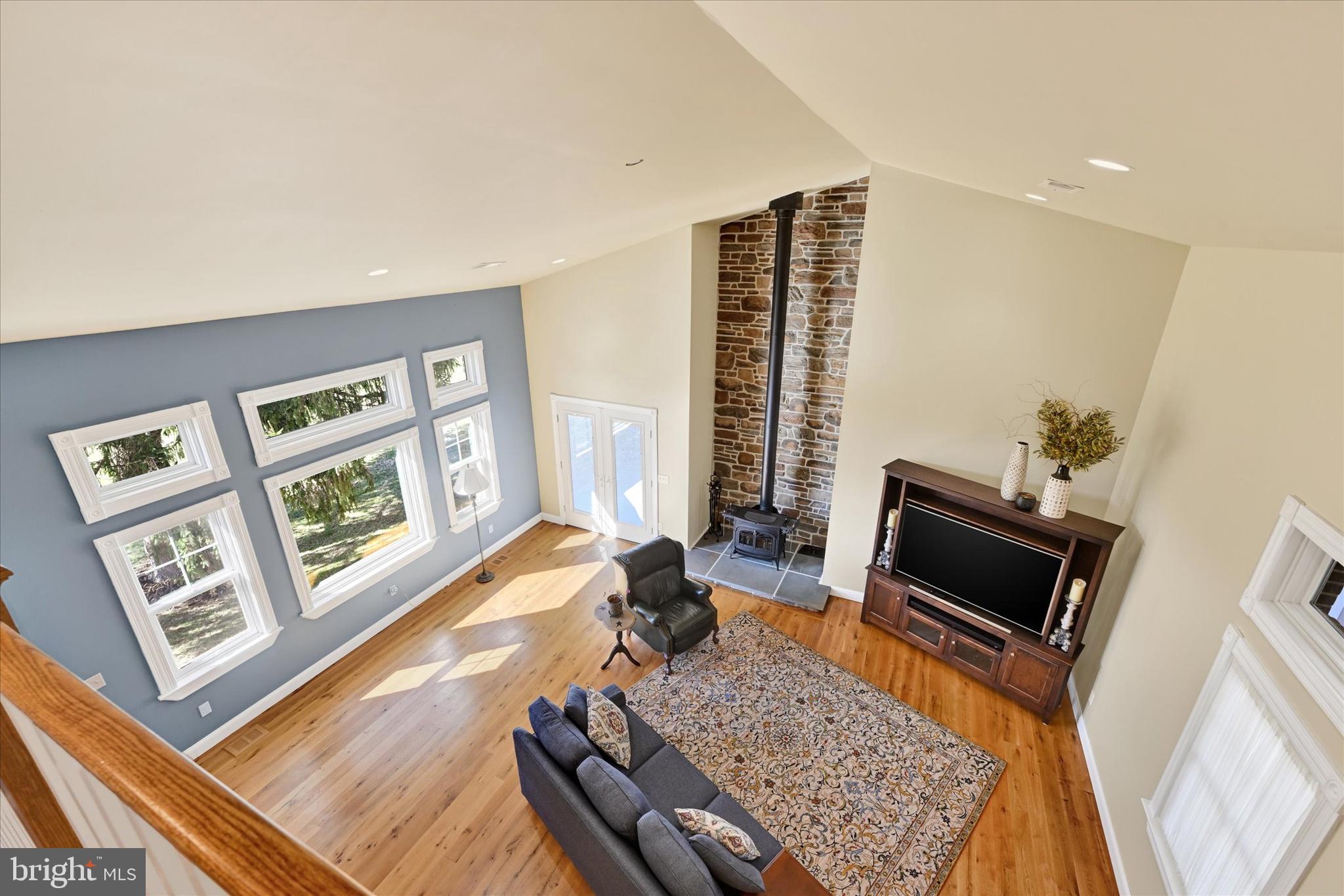 2524 Jennings Chapel Road Woodbine, MD 21797 - Photo 26 of 41 a living room with furniture and a flat screen tv