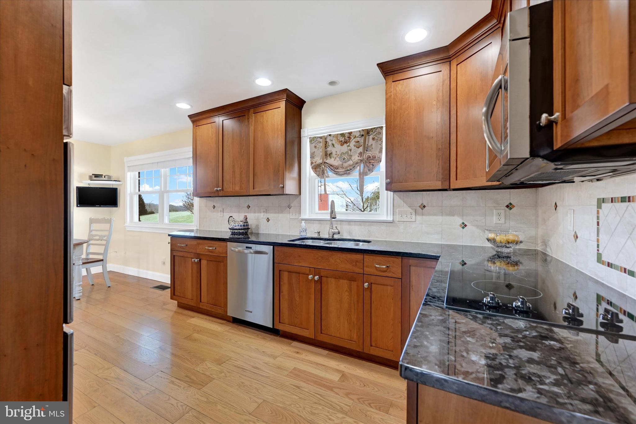 2524 Jennings Chapel Road Woodbine, MD 21797 - Photo 7 of 41 a kitchen with a sink a counter top space and cabinets