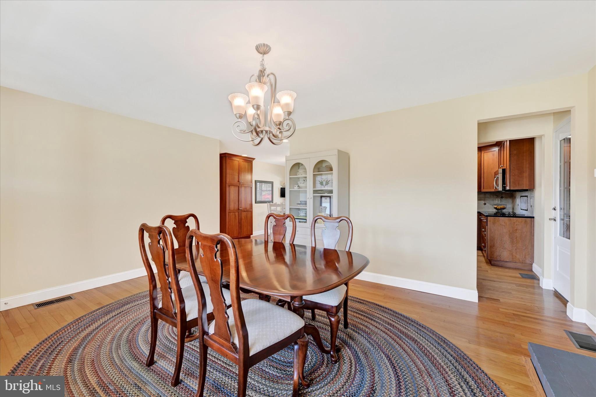 2524 Jennings Chapel Road Woodbine, MD 21797 - Photo 9 of 41 a view of a dining room with furniture and wooden floor