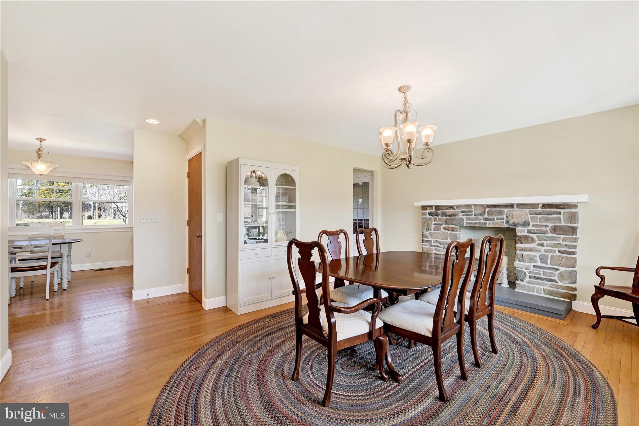 2524 Jennings Chapel Road Woodbine, MD 21797 - Photo 10 of 41 a view of a dining room with furniture window and wooden floor