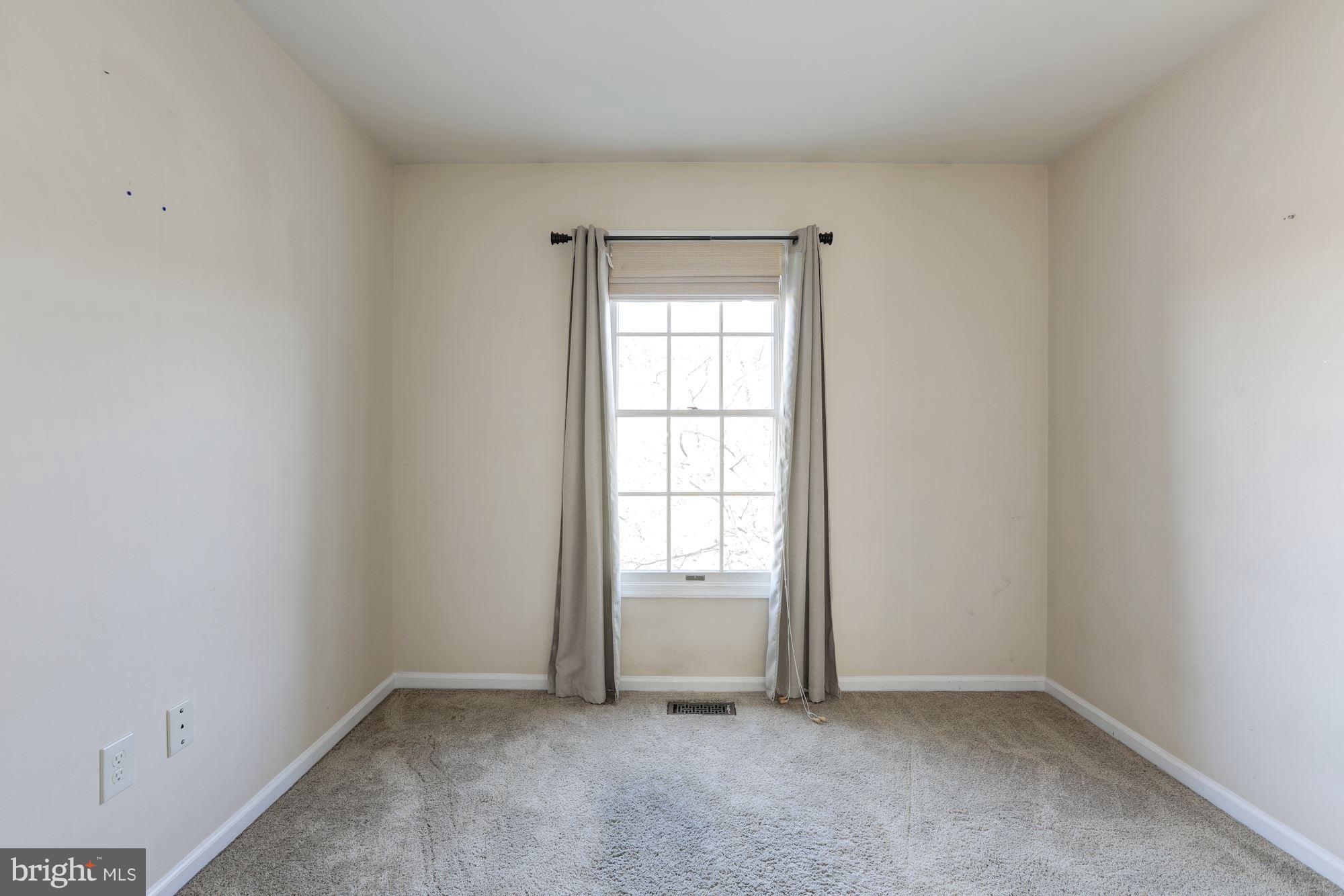 12104 Apache Tears Circle Laurel, MD 20708 - Photo 22 of 30 a view of an empty room with a window