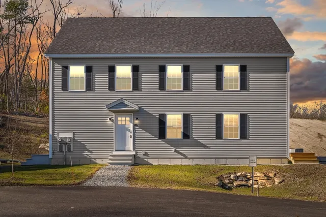 a front view of a house with swimming pool